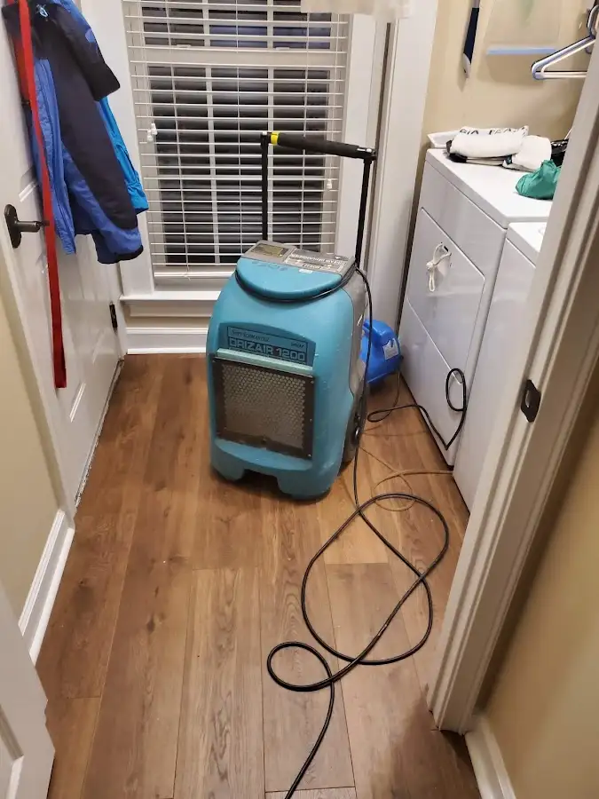 Commercial dehumidifier deployed for Flood Damage Cleanup in Center
